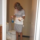 Properly uniformed full service housekeeping maid