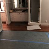 Build a partition wall for a bedroom closet and remove a pony wall in the same bedroom.