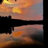 Picture this....peaceful waterfront, smallish cottage but super cute...fun mother and son need some help!