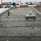 Kelbie home imp inc Flat roofer