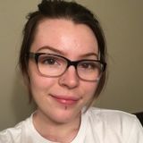 Mature university student interviewing for childcare position.