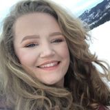 Responsible young woman with much livestock and pet care experience